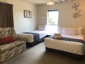 Family Room, Non Smoking, Kitchen (One bedroom) | Desk, laptop workspace, iron/ironing board, free cots/infant beds