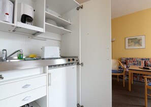 Fridge, stovetop, coffee/tea maker, cookware/dishes/utensils