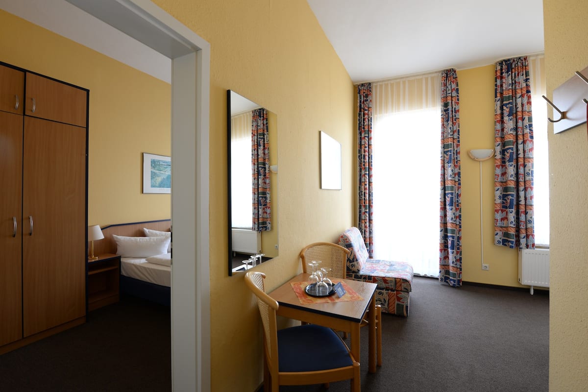 Apartment, 2 Bedrooms, Balcony (south side) | Cribs/infant beds