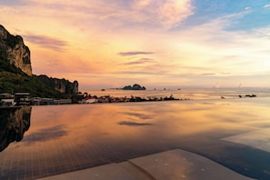 2 outdoor pools, open 7:00 AM to 7:00 PM, pool umbrellas, sun loungers