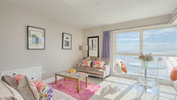 Apartment, 2 Bedrooms (Sea View) | Living area | Plasma TV, DVD player