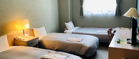 Triple Room, Multiple Beds | Iron/ironing board, free WiFi, bed sheets