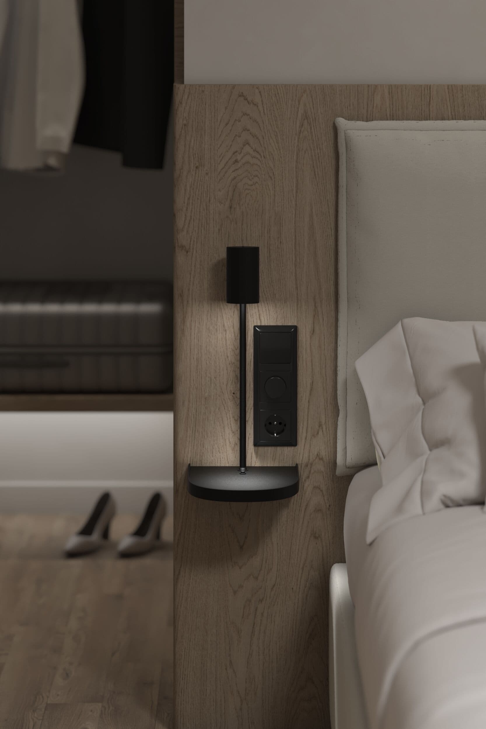 A modern bedroom with a wooden headboard, a bedside table with a black lamp, and a bed with white bedding.
