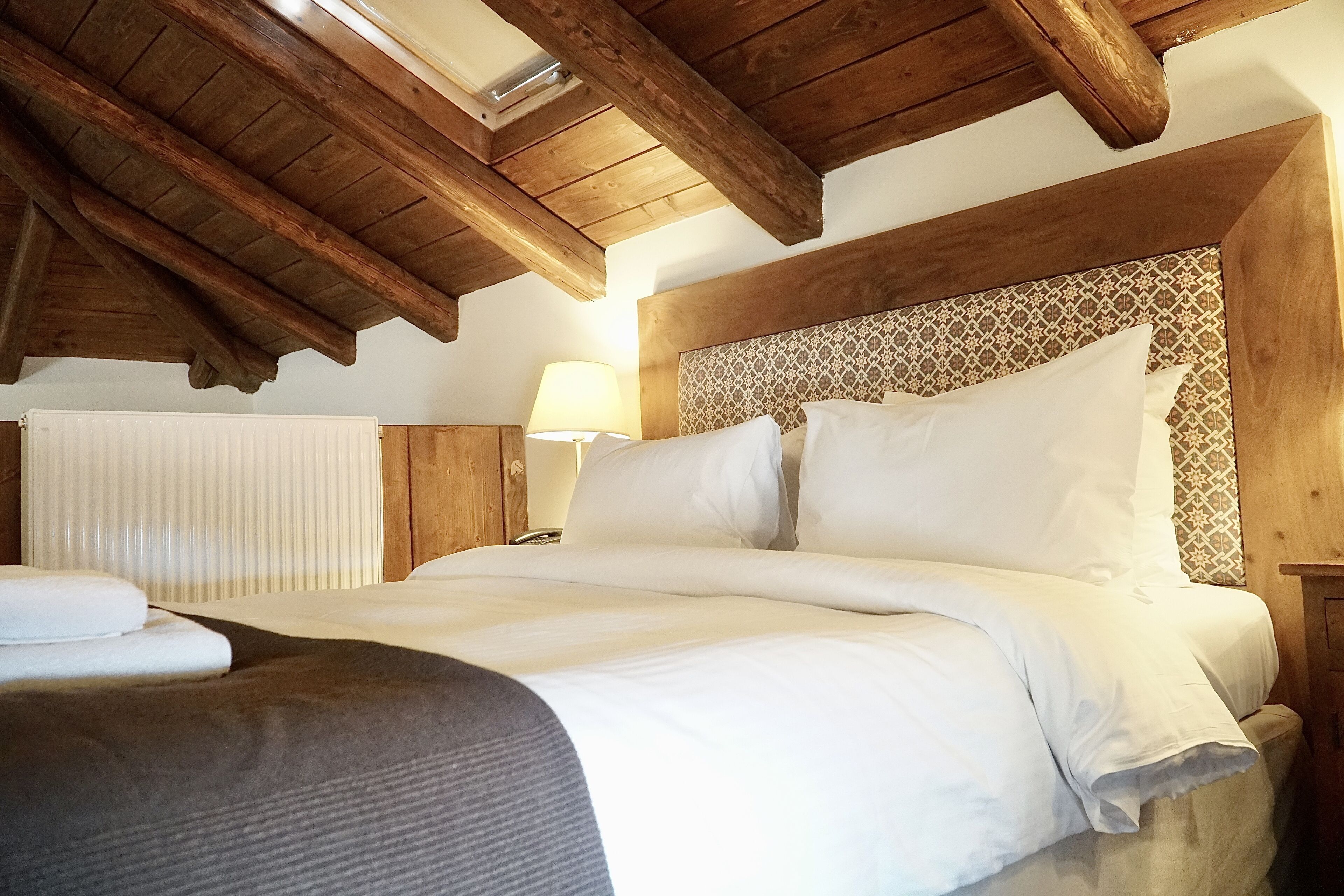 family room, fireplace (maisonette with attic) | premium bedding, down duvets, pillow-top beds, minibar