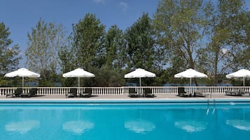 Seasonal outdoor pool, pool umbrellas, pool loungers