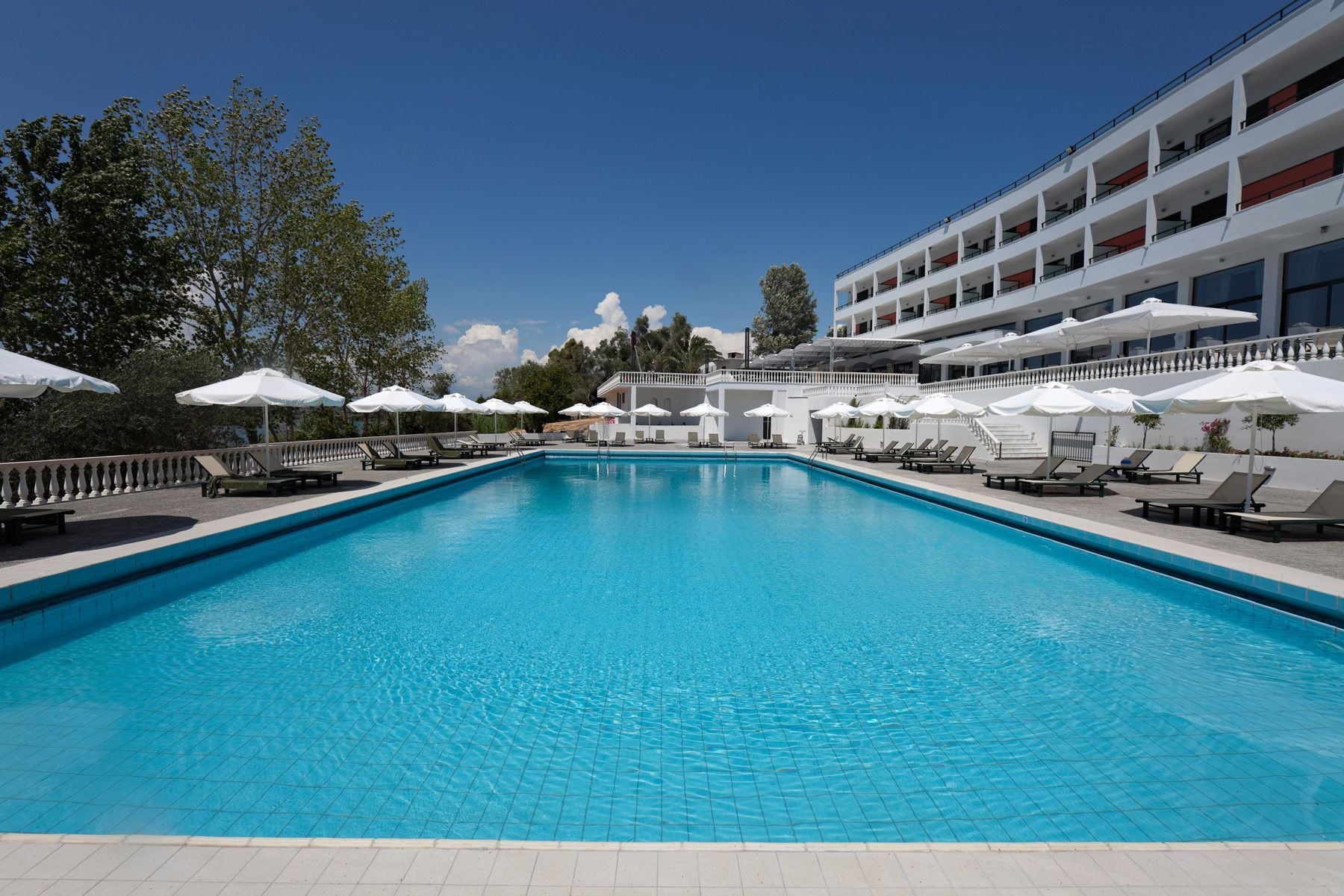 Seasonal outdoor pool, pool umbrellas, sun loungers