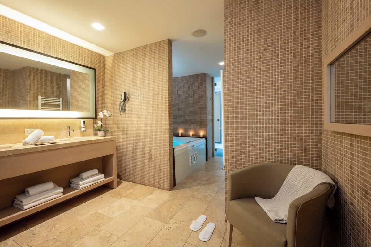 shower, designer toiletries, hair dryer, bathrobes