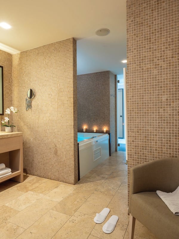 Shower, designer toiletries, hair dryer, bathrobes