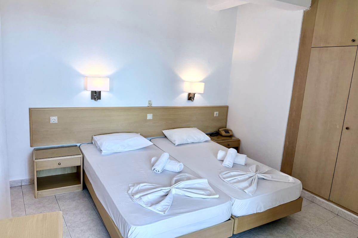 Family Room with City & Sea view | Camas con pillow-top, escritorio, wifi gratis y ropa de cama