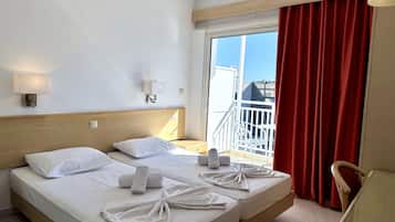Colchones con pillow-top, escritorio, wifi gratis y ropa de cama