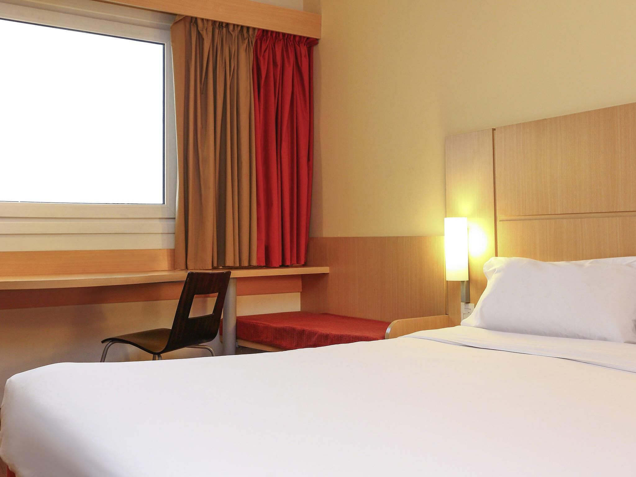 Standard Room, Multiple Beds | In-room safe, desk, blackout drapes, soundproofing