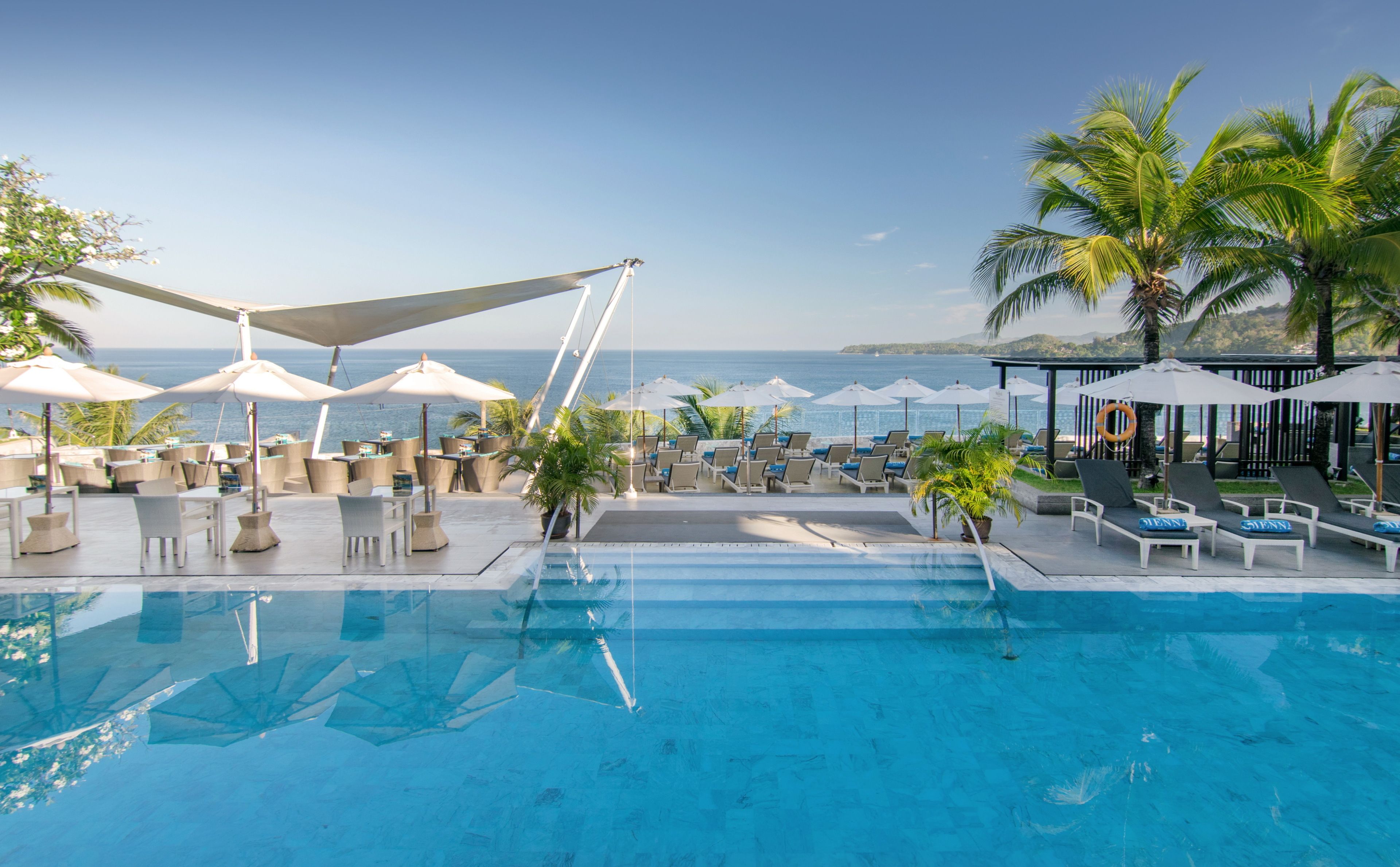 2 outdoor pools, open 10 AM to 8 PM, pool umbrellas, pool loungers