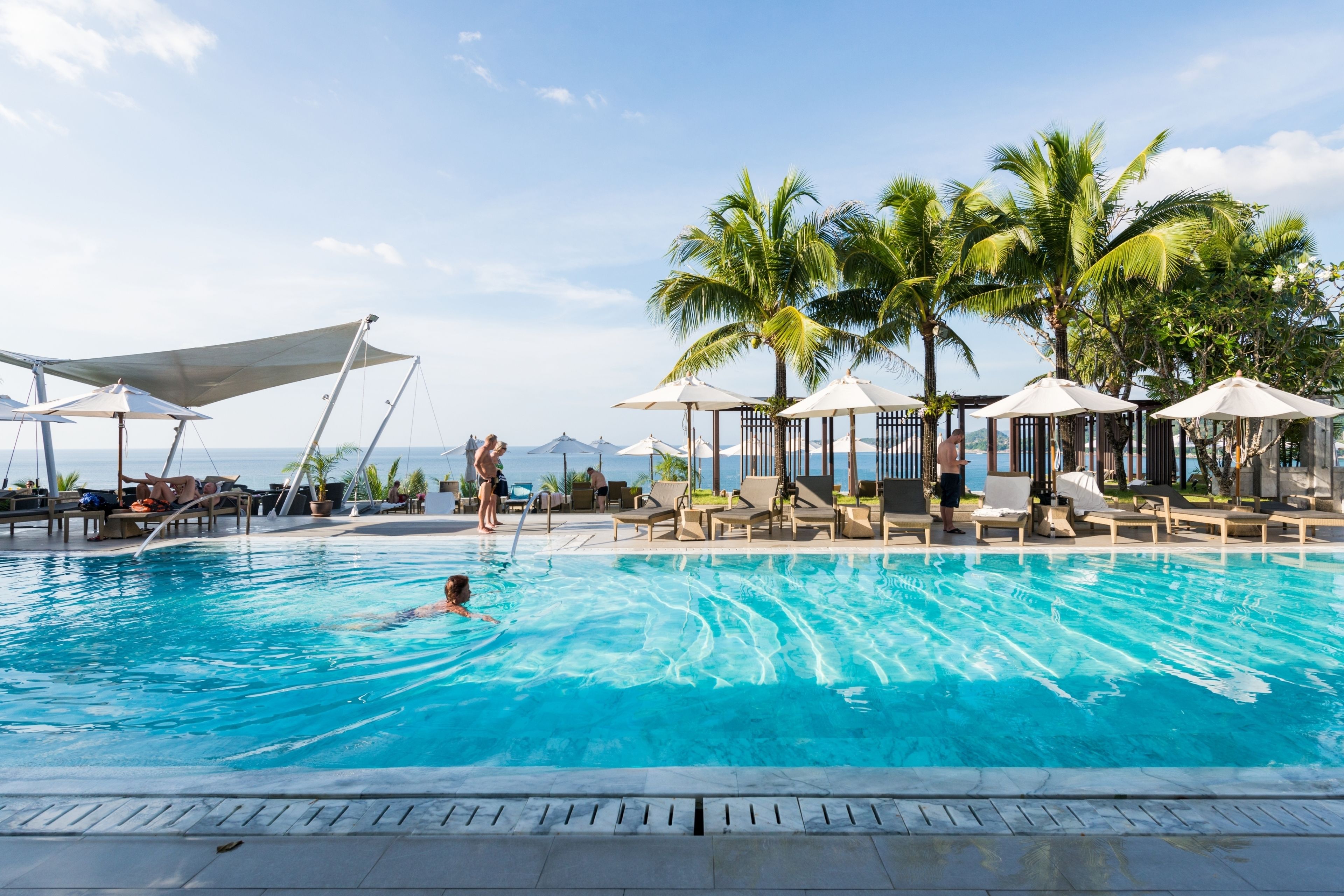 2 outdoor pools, open 10 AM to 8 PM, pool umbrellas, sun loungers