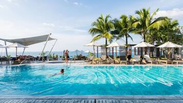 2 outdoor pools, open 10 AM to 8 PM, pool umbrellas, pool loungers