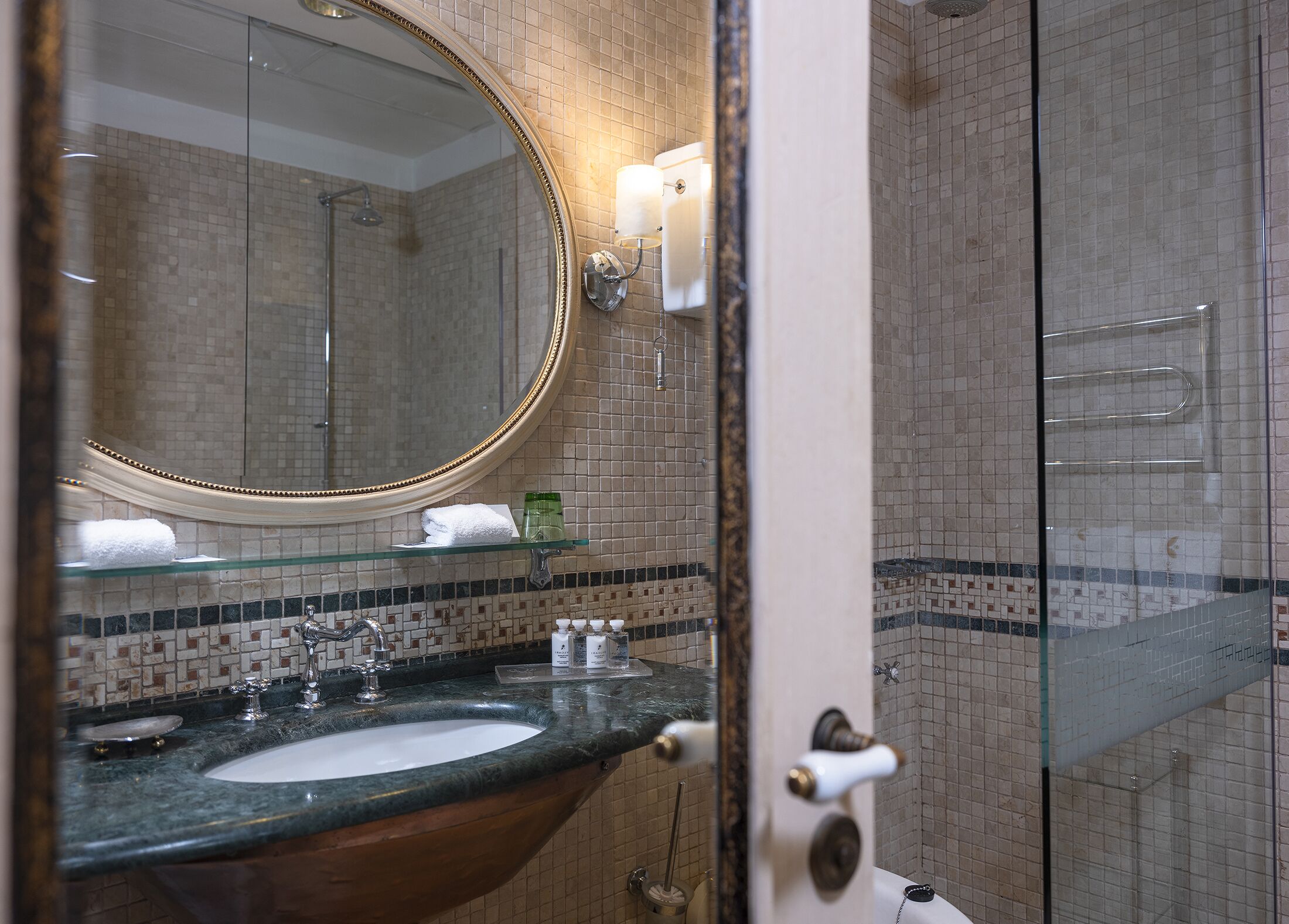 deluxe room | bathroom | designer toiletries, hair dryer, bathrobes, slippers