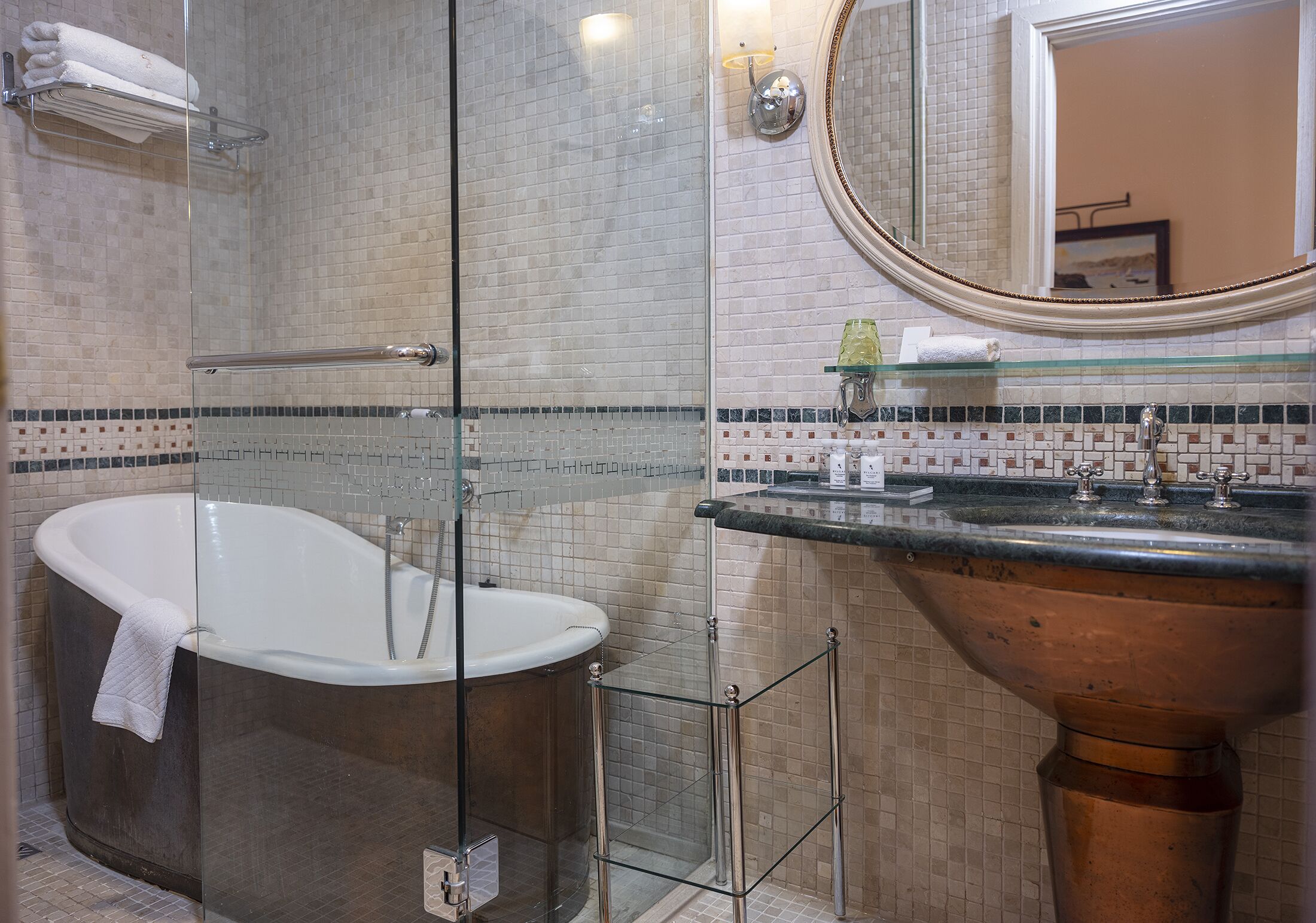 deluxe room | bathroom | designer toiletries, hair dryer, bathrobes, slippers