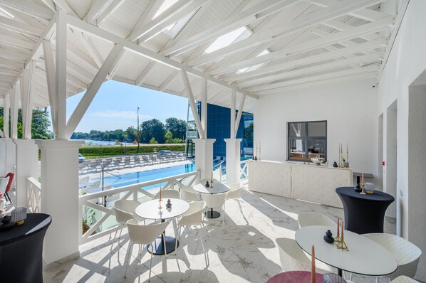 Indoor pool, seasonal outdoor pool, pool umbrellas, sun loungers
