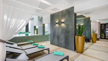 Indoor pool, seasonal outdoor pool, pool umbrellas, pool loungers