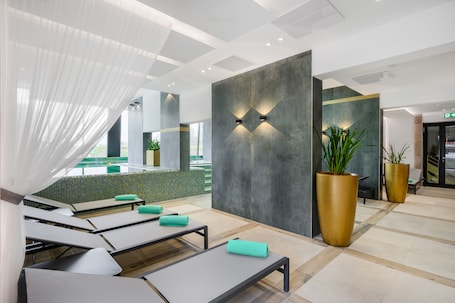 Indoor pool, seasonal outdoor pool, pool umbrellas, sun loungers