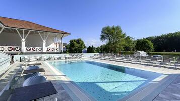 Indoor pool, seasonal outdoor pool, pool umbrellas, sun loungers