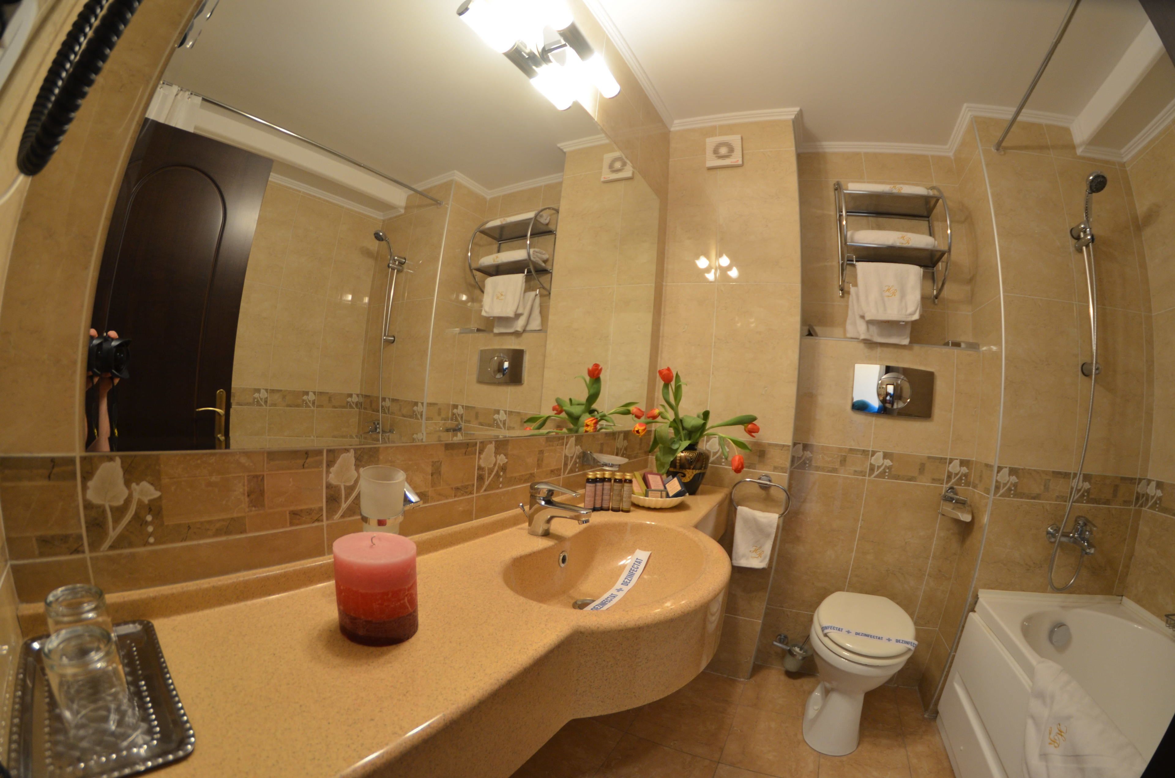 hair dryer, bathrobes, slippers, towels