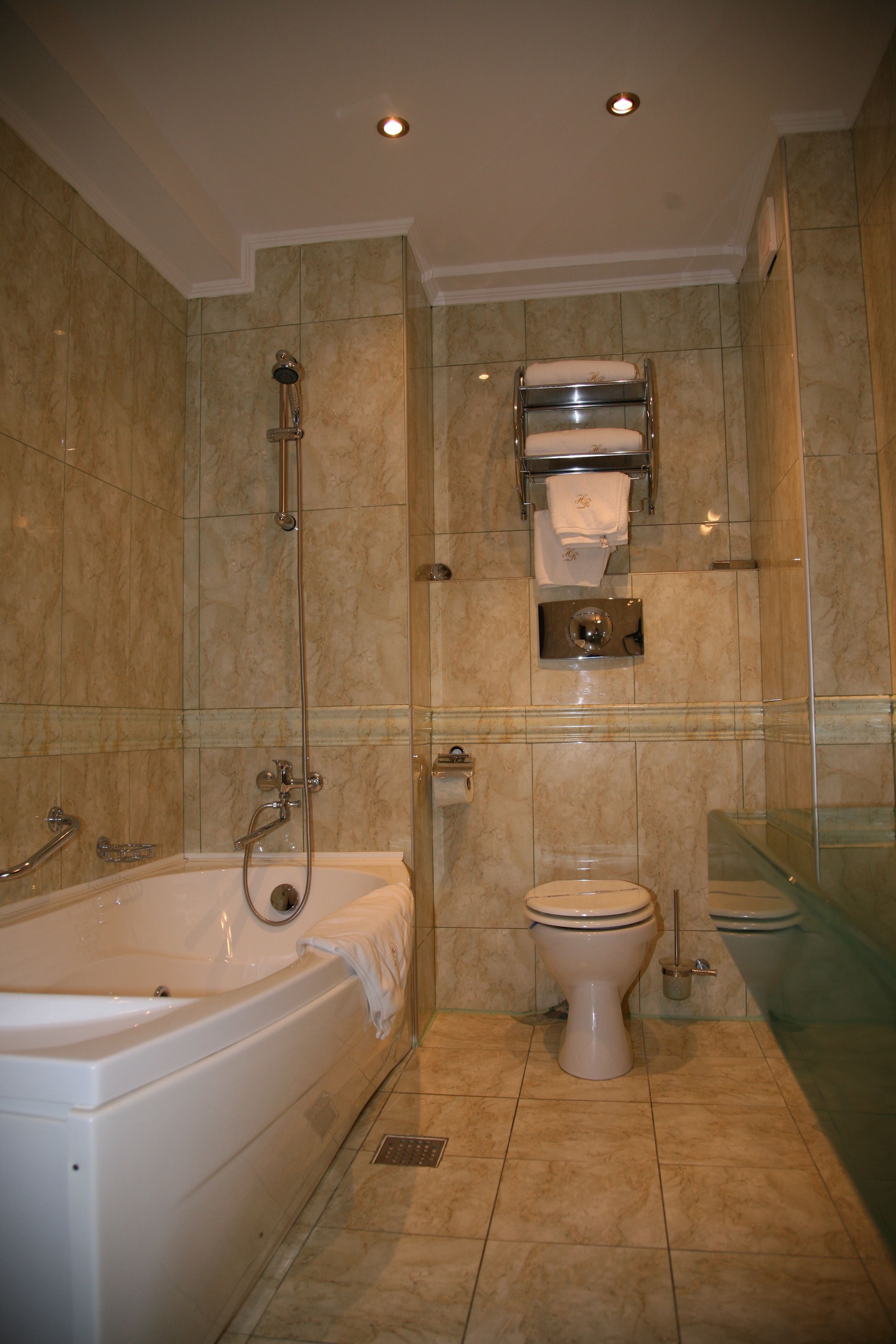 standard apartment | bathroom | hair dryer, bathrobes, slippers, towels