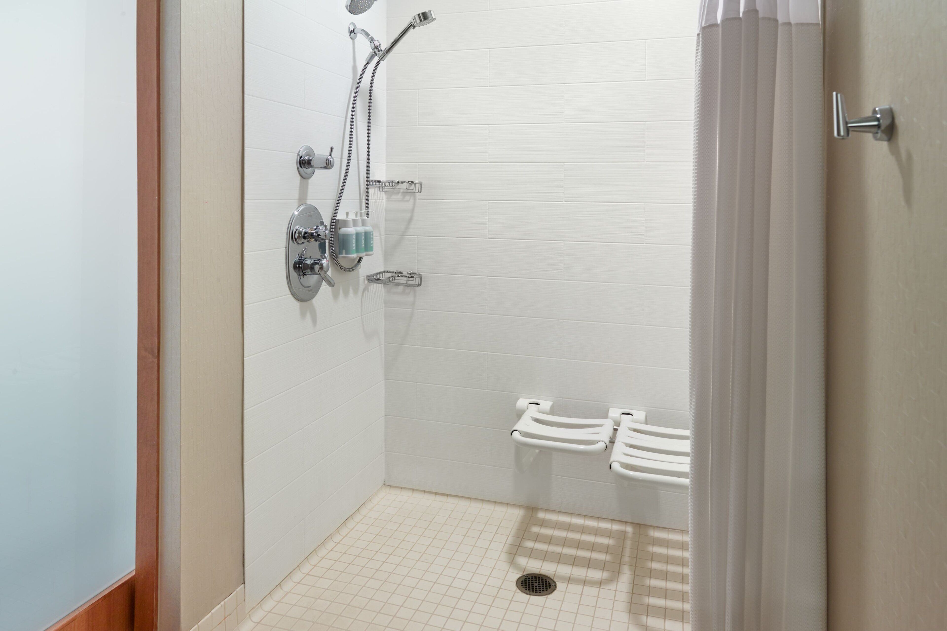 combined shower/bathtub, free toiletries, hair dryer, towels