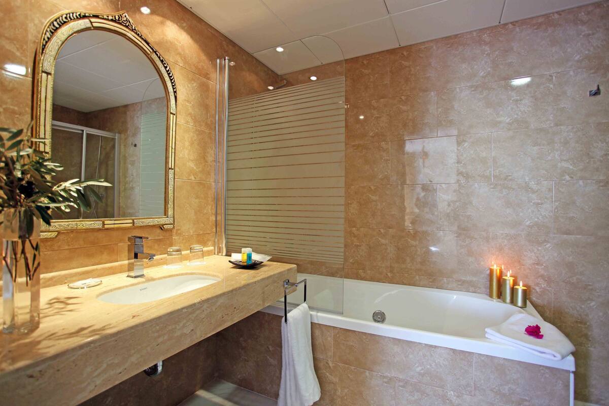 free toiletries, hair dryer, bidet, towels