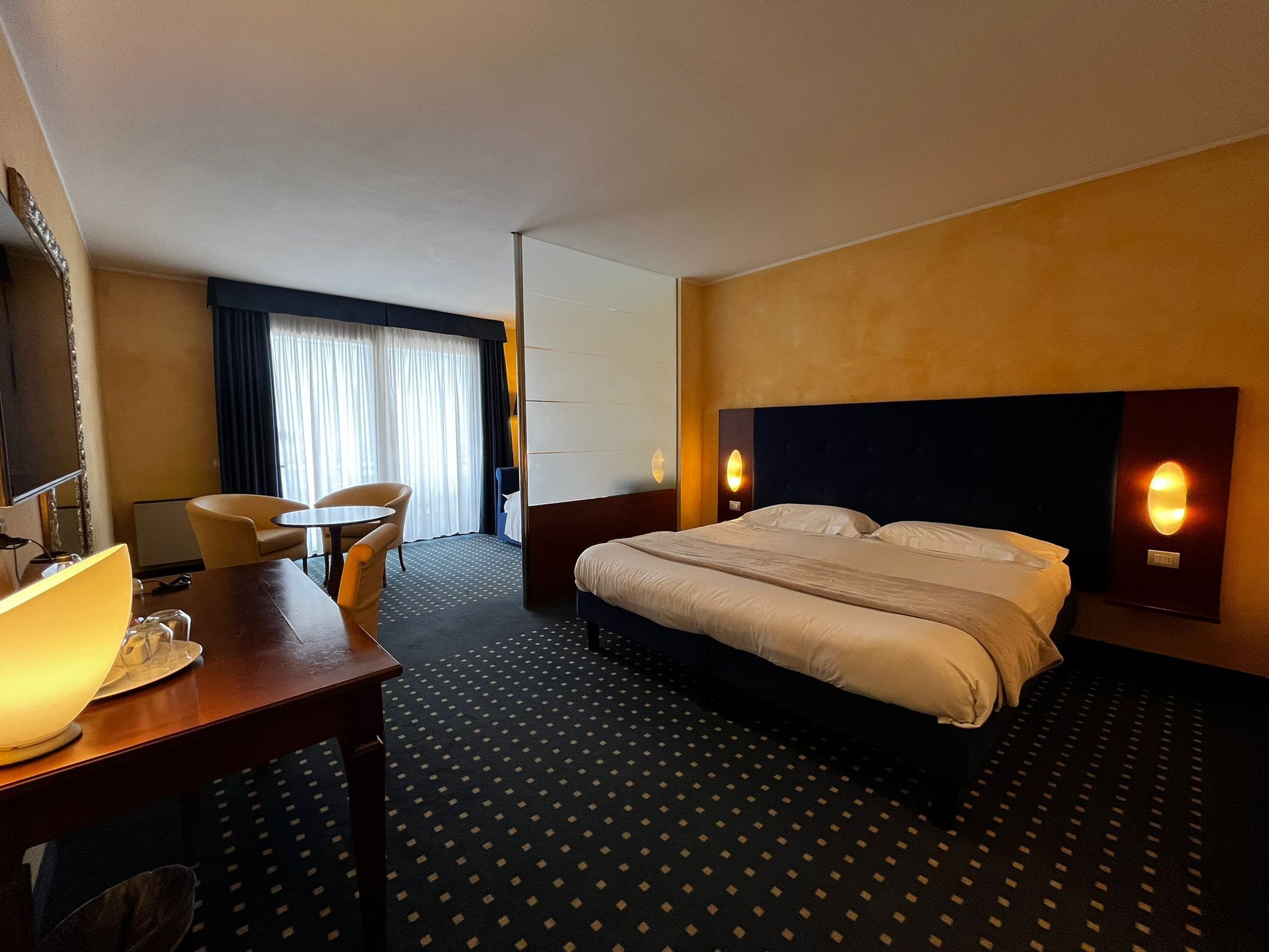 family suite , lake view | living area | flat-screen tv