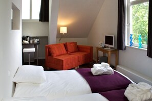Habitación estándar | Sábanas de algodón egipcio y camas Select Comfort