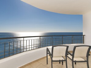 A balcony with two chairs facing a sea view. - Olée Nerja Holiday Rentals By Fuerte Group (Torrox)