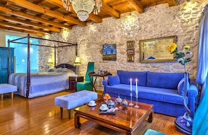 Executive Suite | Living area | Flat-screen TV, DVD player, first-run movies