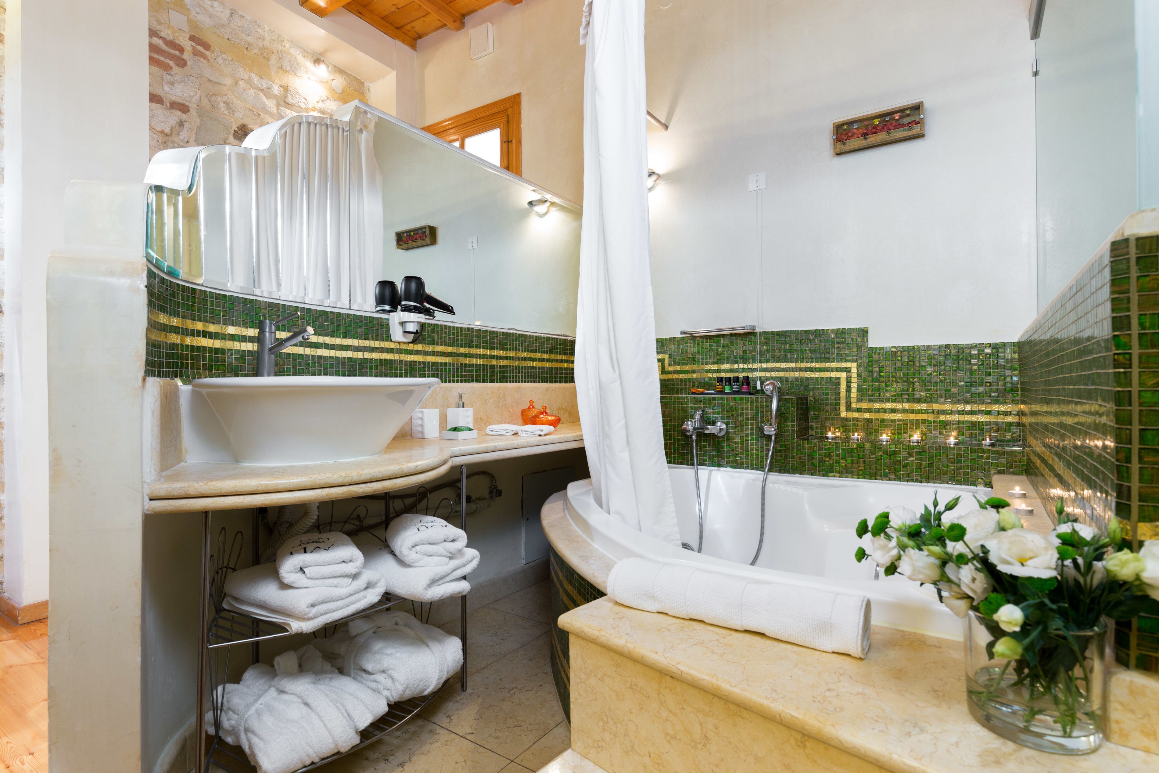 junior suite | bathroom | designer toiletries, hair dryer, towels