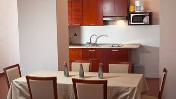 Comfort Apartment | Private kitchen | Fridge, microwave, stovetop, dishwasher