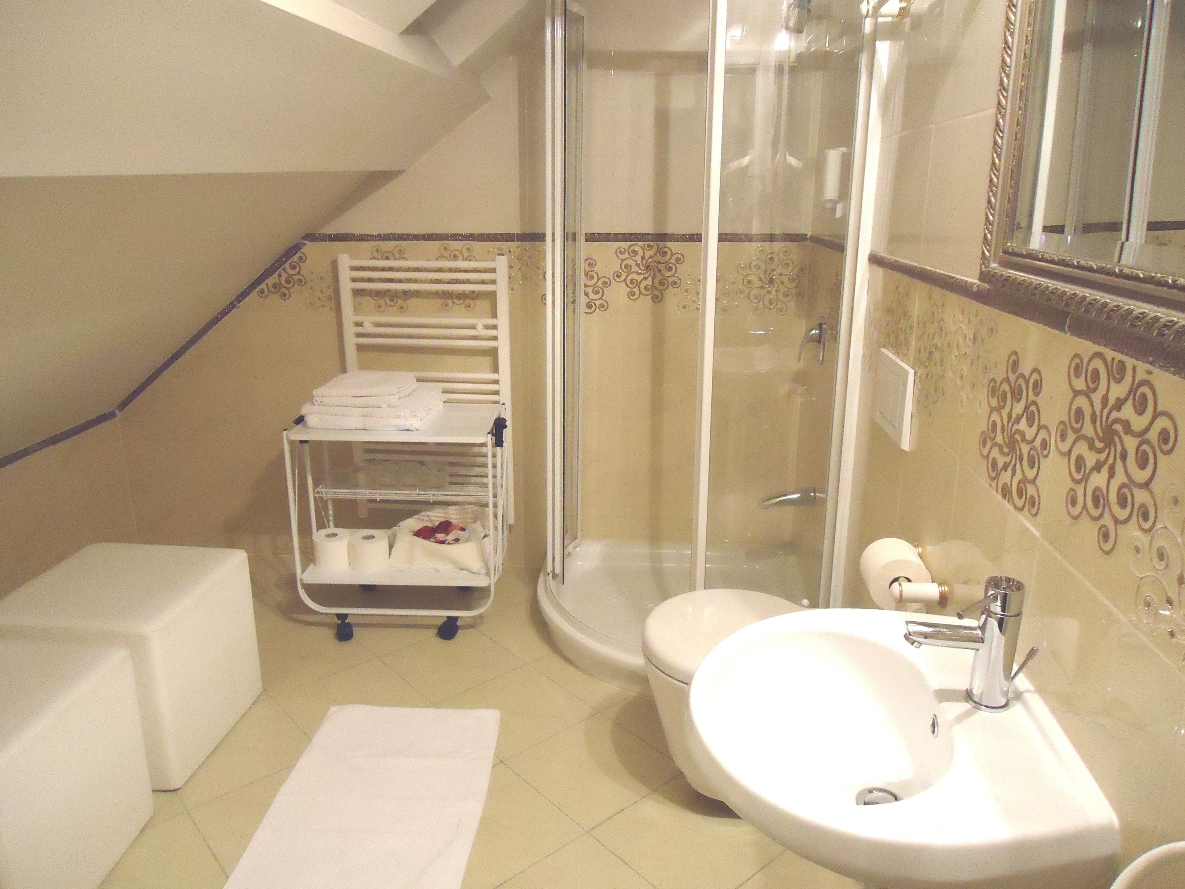 classic quadruple room | bathroom | shower, rainfall showerhead, hair dryer, bathrobes