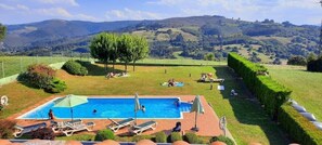 Outdoor pool, open 10:30 AM to 7:30 PM, pool umbrellas, pool loungers