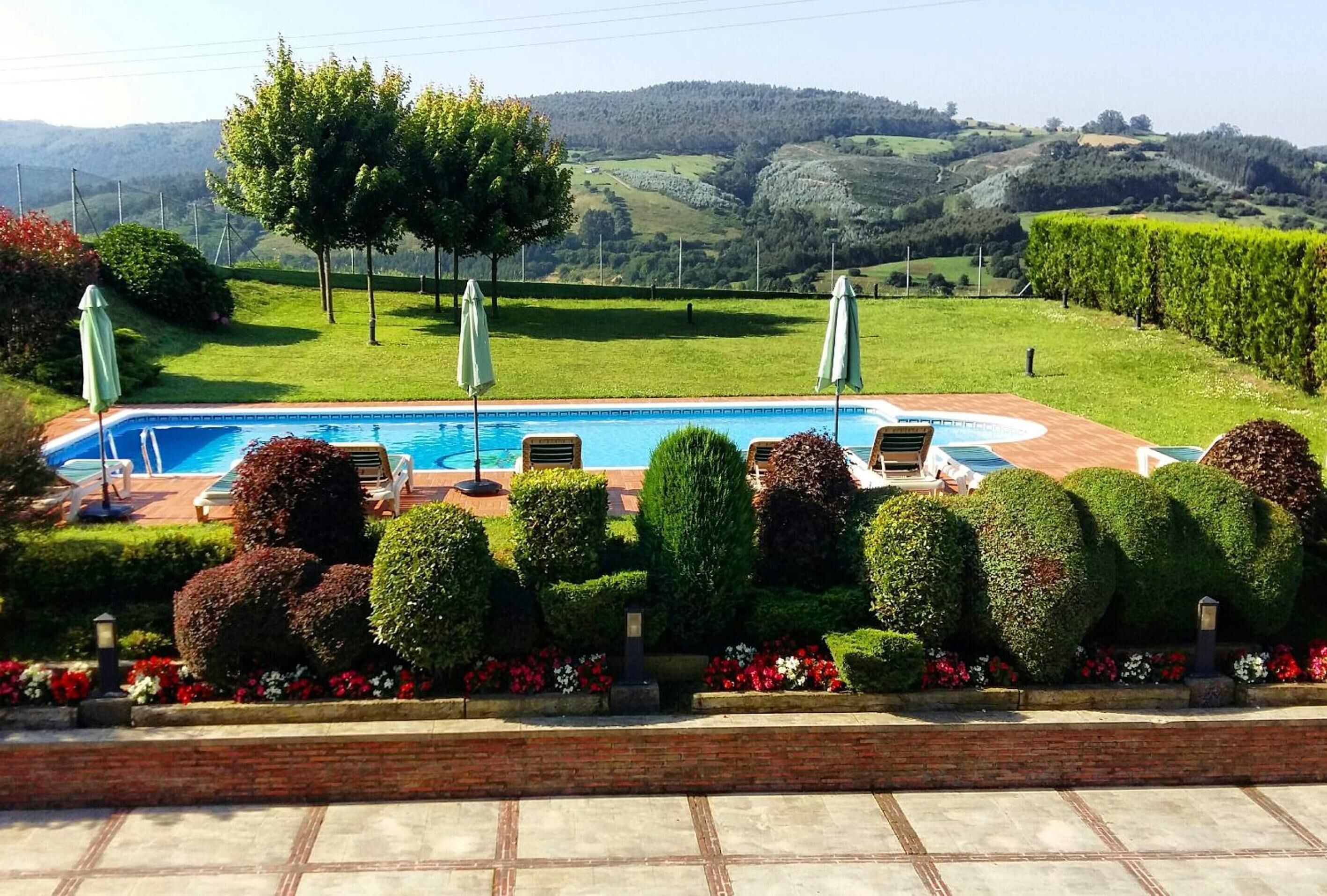 outdoor pool, open 10:30 am to 7:30 pm, pool umbrellas, pool loungers