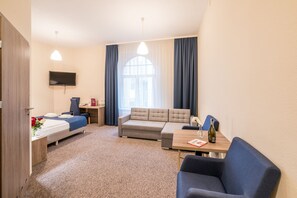 Superior Double Room | Living area | LCD TV - Lothus Hotel (Wroclaw)