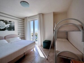 Family Quadruple Room, Sea View | In-room safe, desk, soundproofing, free WiFi