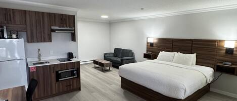 Habitación Premium, 1 cama King size, cocineta | Insonorización, tabla de planchar con plancha y cunas gratuitas