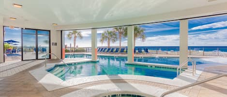 Indoor pool, outdoor pool, pool umbrellas, pool loungers