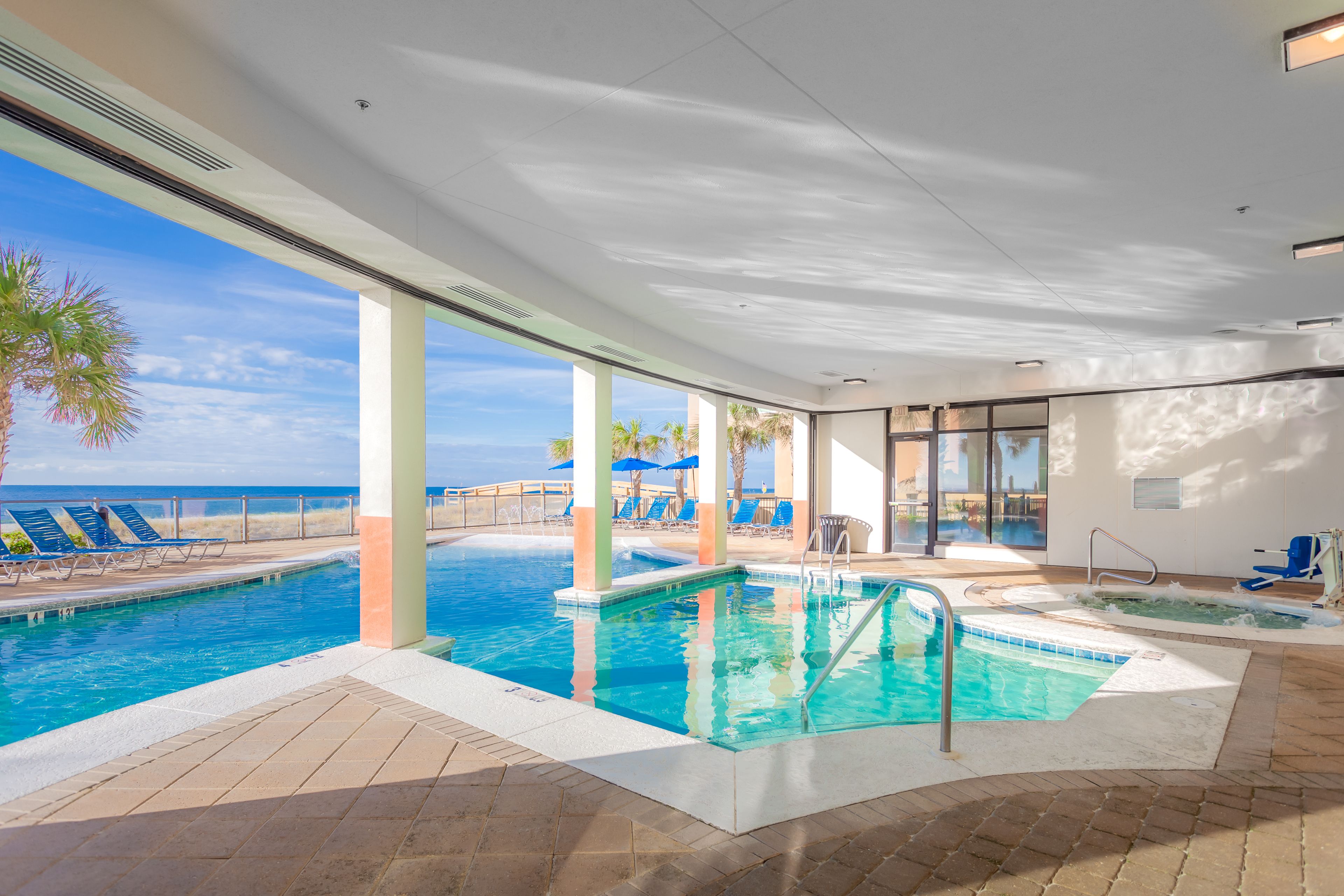 indoor pool, outdoor pool, pool umbrellas, pool loungers