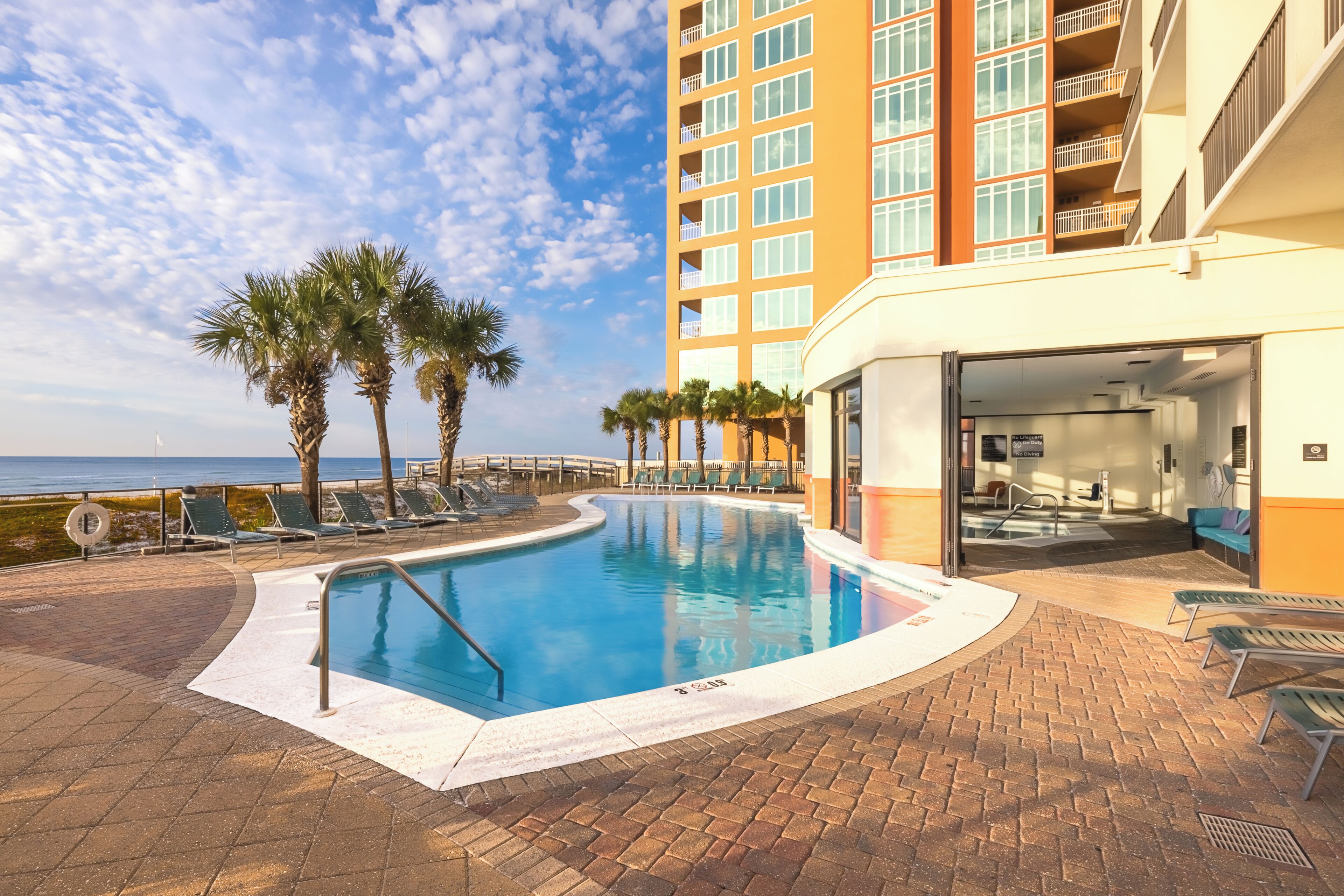 Indoor pool, outdoor pool, pool umbrellas, pool loungers