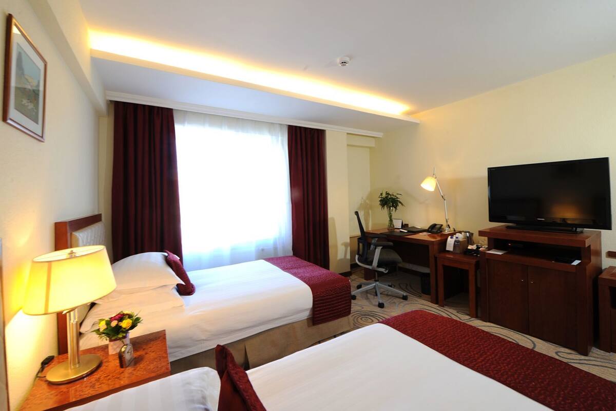 Egyptian cotton sheets, premium bedding, down comforters, minibar