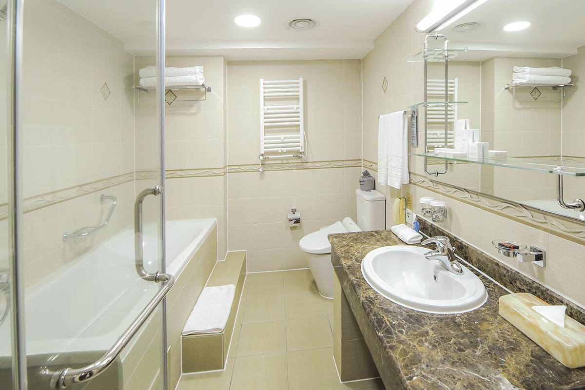 superior suite (superior suite) | bathroom | separate bathtub and shower, deep-soaking bathtub, rainfall showerhead
