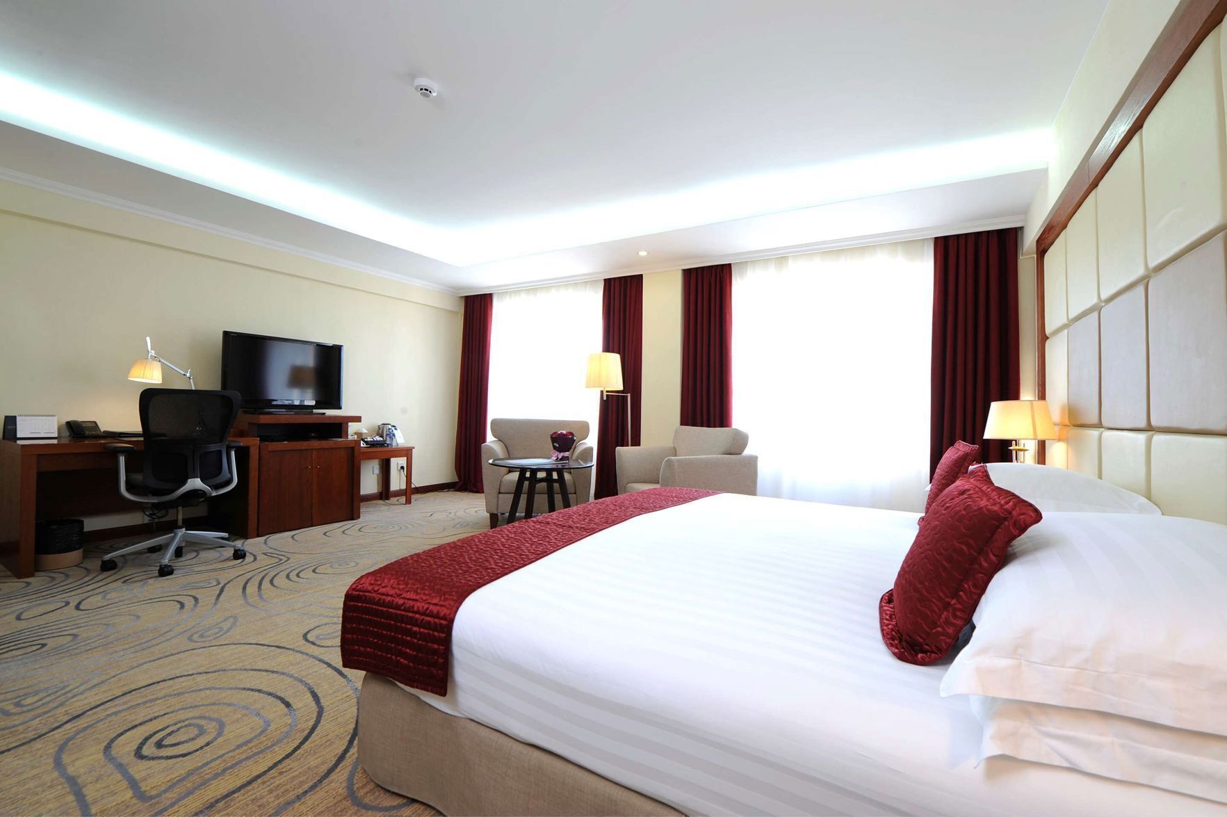 Egyptian cotton sheets, premium bedding, down comforters, minibar