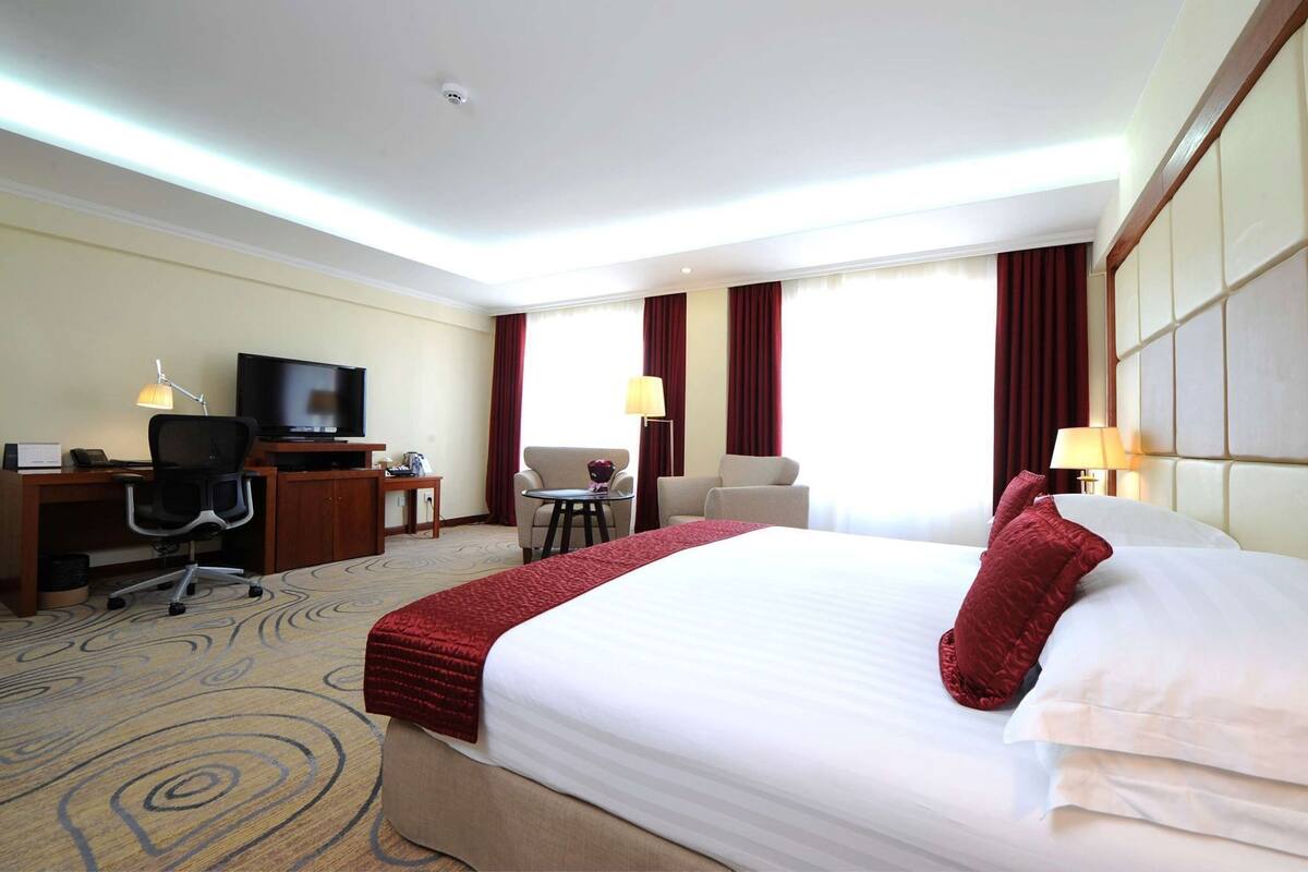 Egyptian cotton sheets, premium bedding, down comforters, minibar