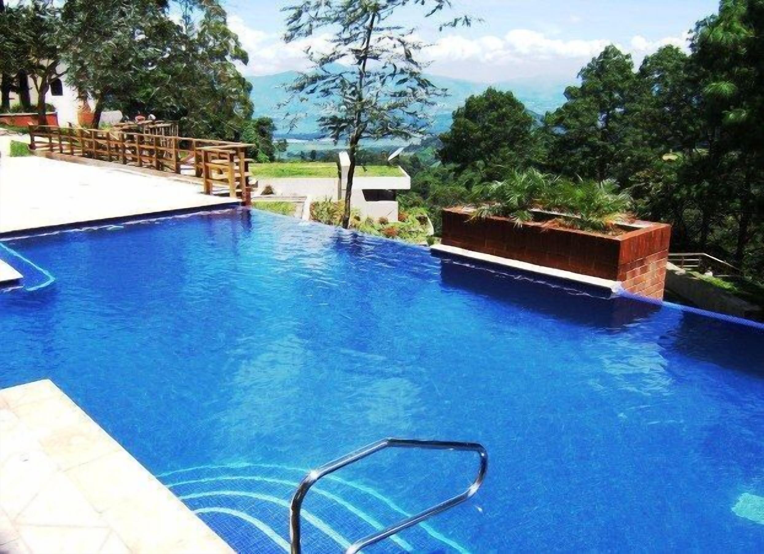 indoor pool, outdoor pool, open 9:00 am to 7:00 pm, pool loungers