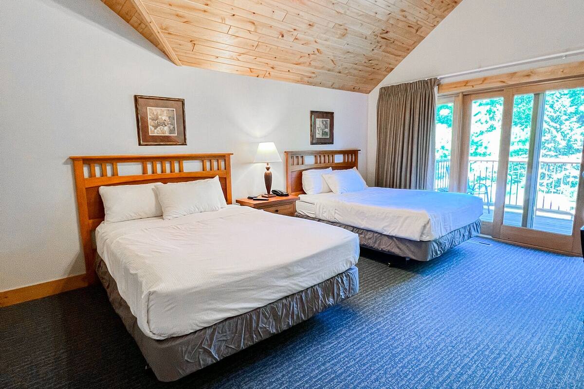 villa, 2 queen beds (bay lake, upper queen) | iron/ironing board, free wifi, bed sheets