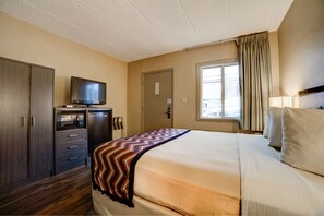 Premium bedding, desk, laptop workspace, soundproofing